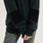 Pull à col roulé vert et jaune