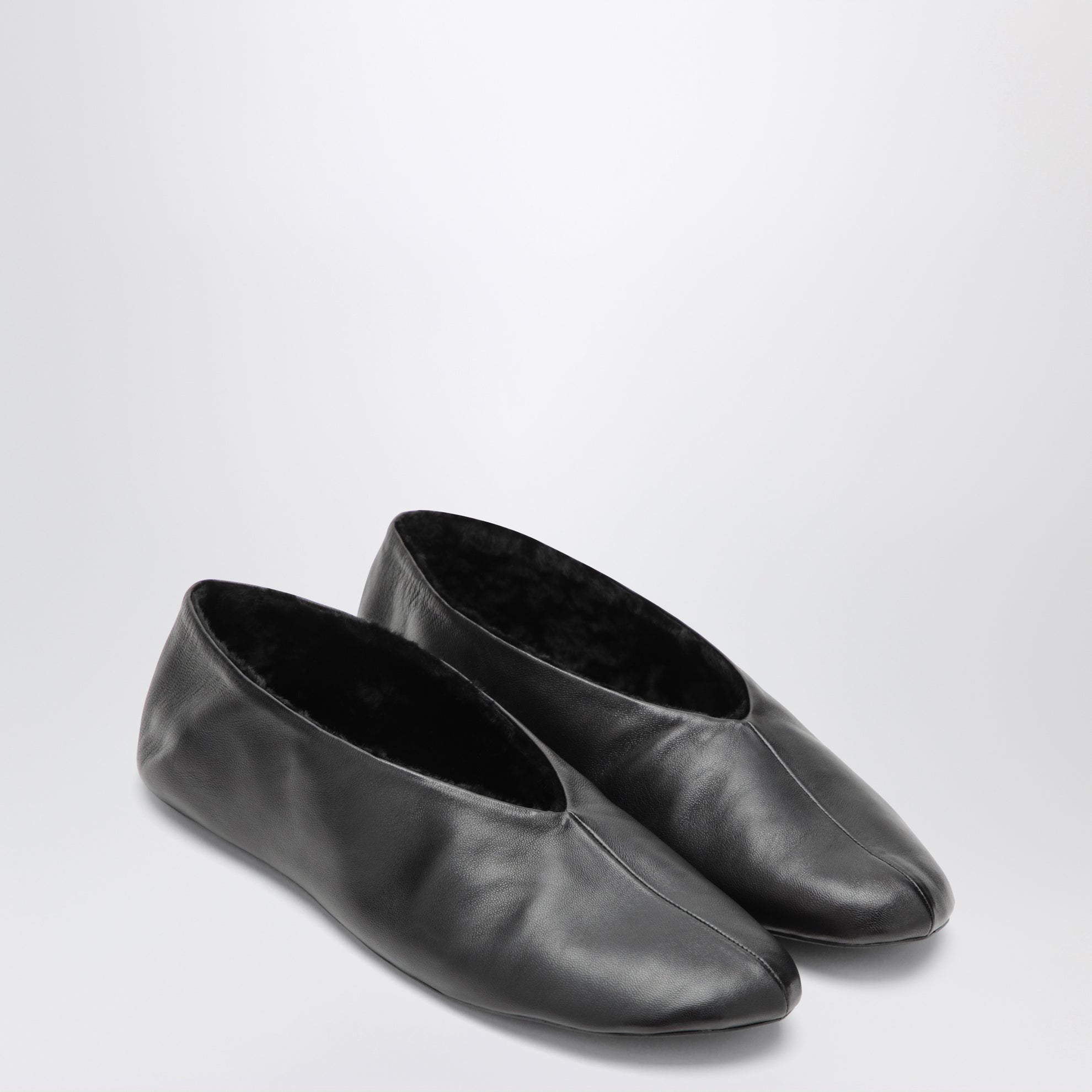 Schwarze Stella Ballerinas aus Leder und Shearling