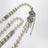 Collier de perles avec fermoir fleur en cristal argenté