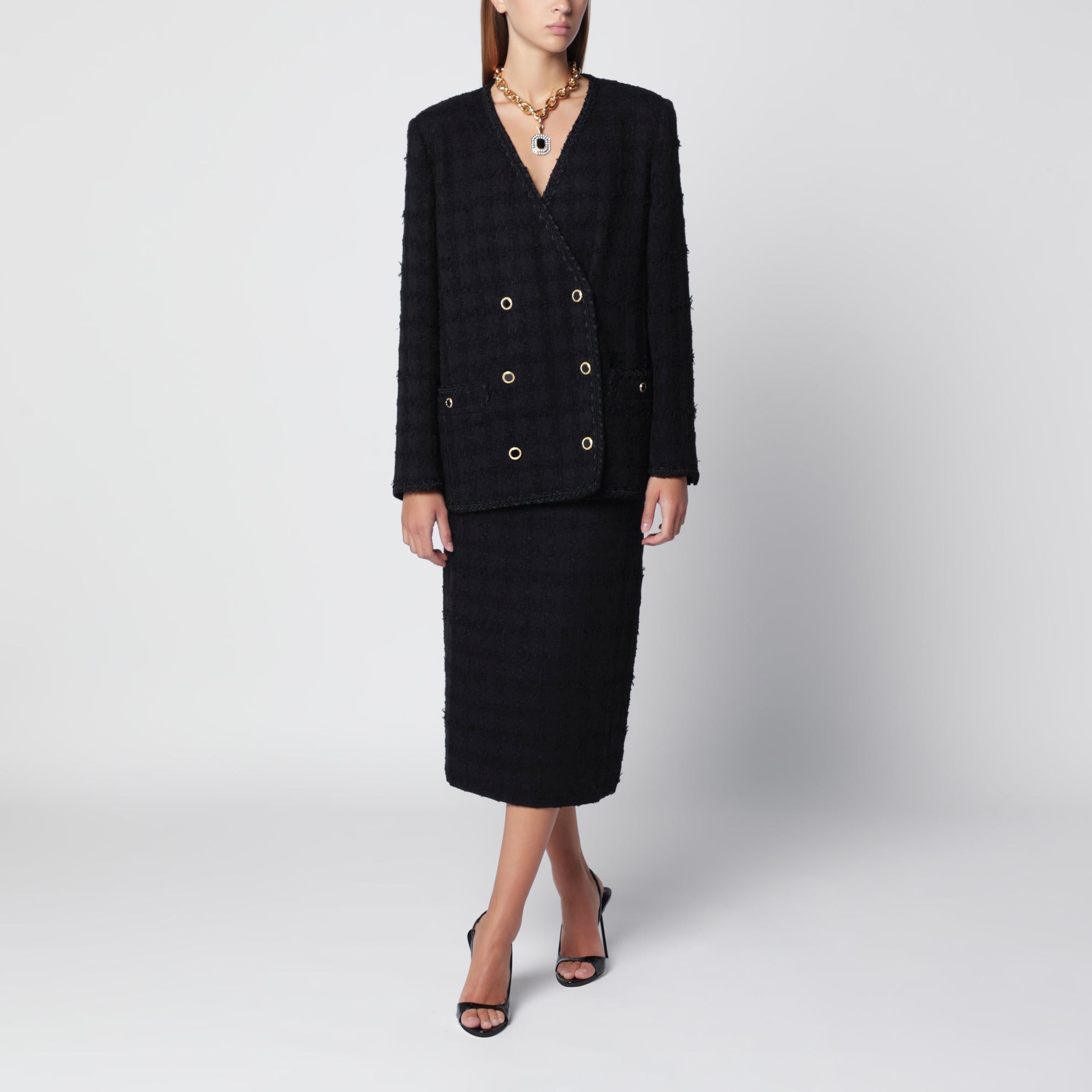Giacca doppiopetto nera in tweed bouclé
