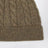 Bonnet couleur biscuit en cachemire torsadé