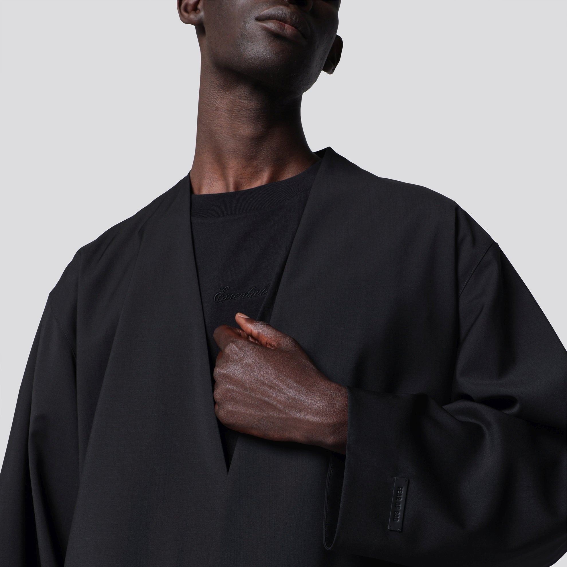 Schwarze Wolljacke mit Schalkragen