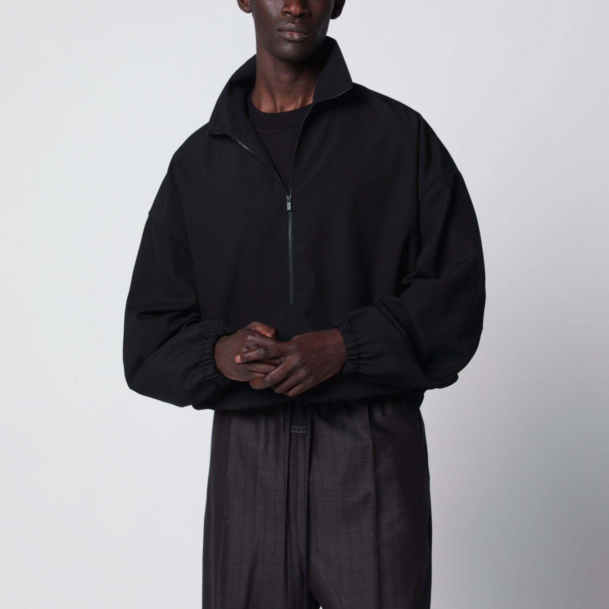 Schwarze Ripstop-Wolljacke mit halbem Reißverschluss