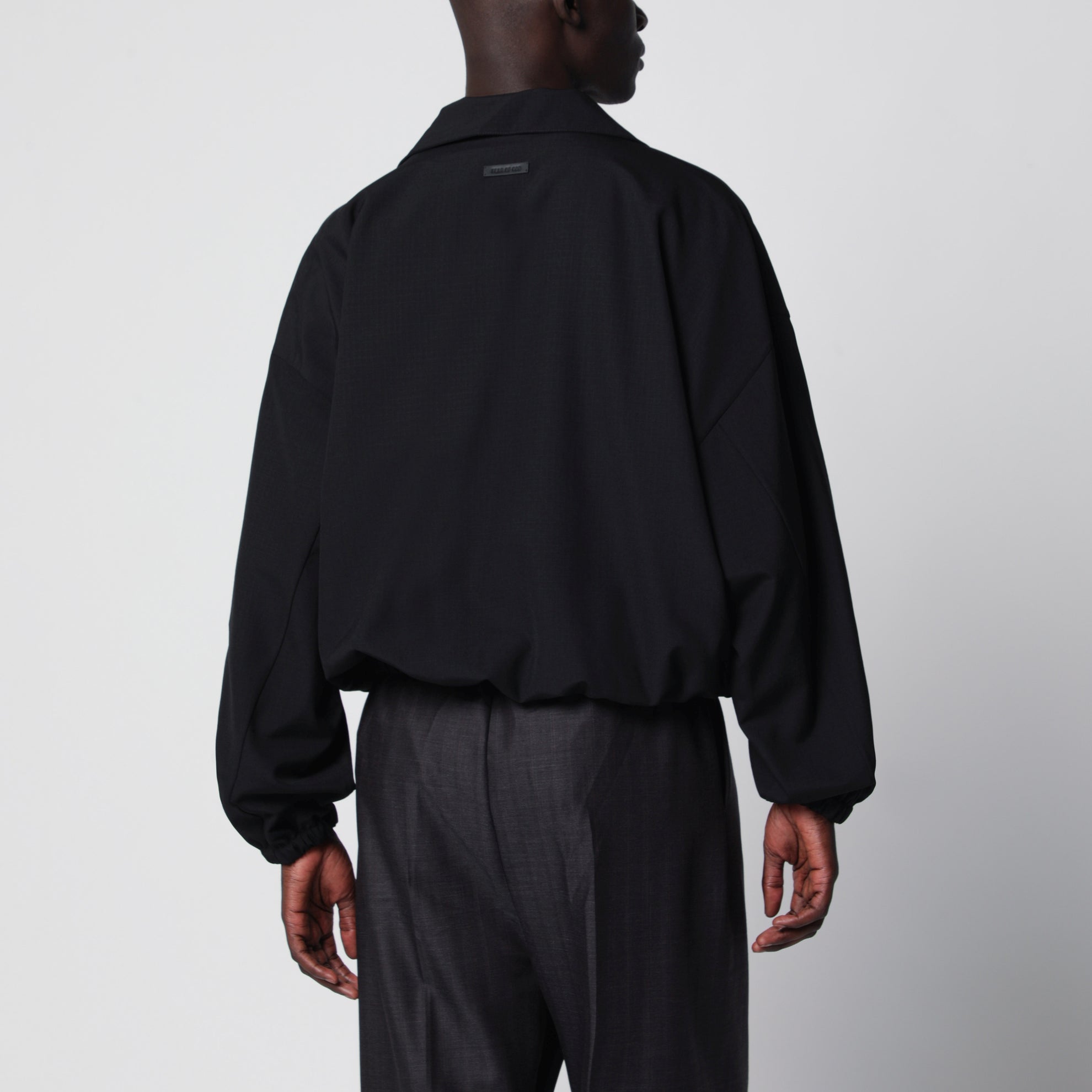 Schwarze Ripstop-Wolljacke mit halbem Reißverschluss