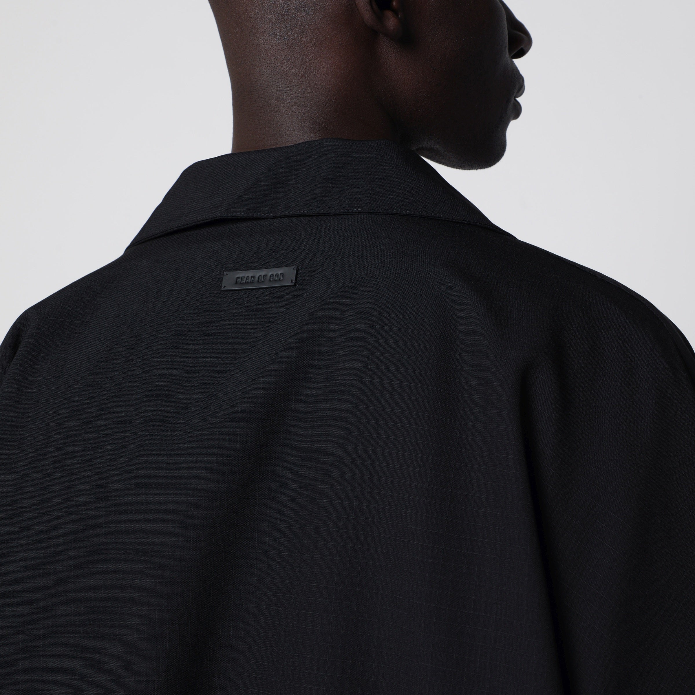 Fear of God Black ripstop wool jacket with black half zip | TheDoubleF