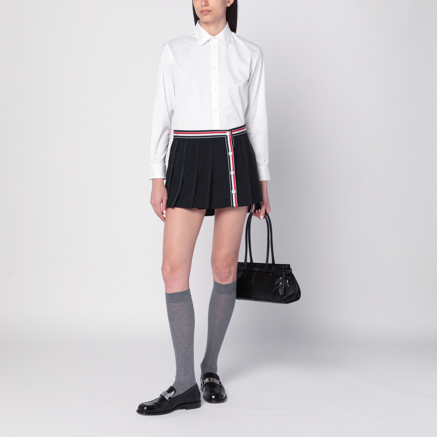 Black ruffled mini skirt in wool blend