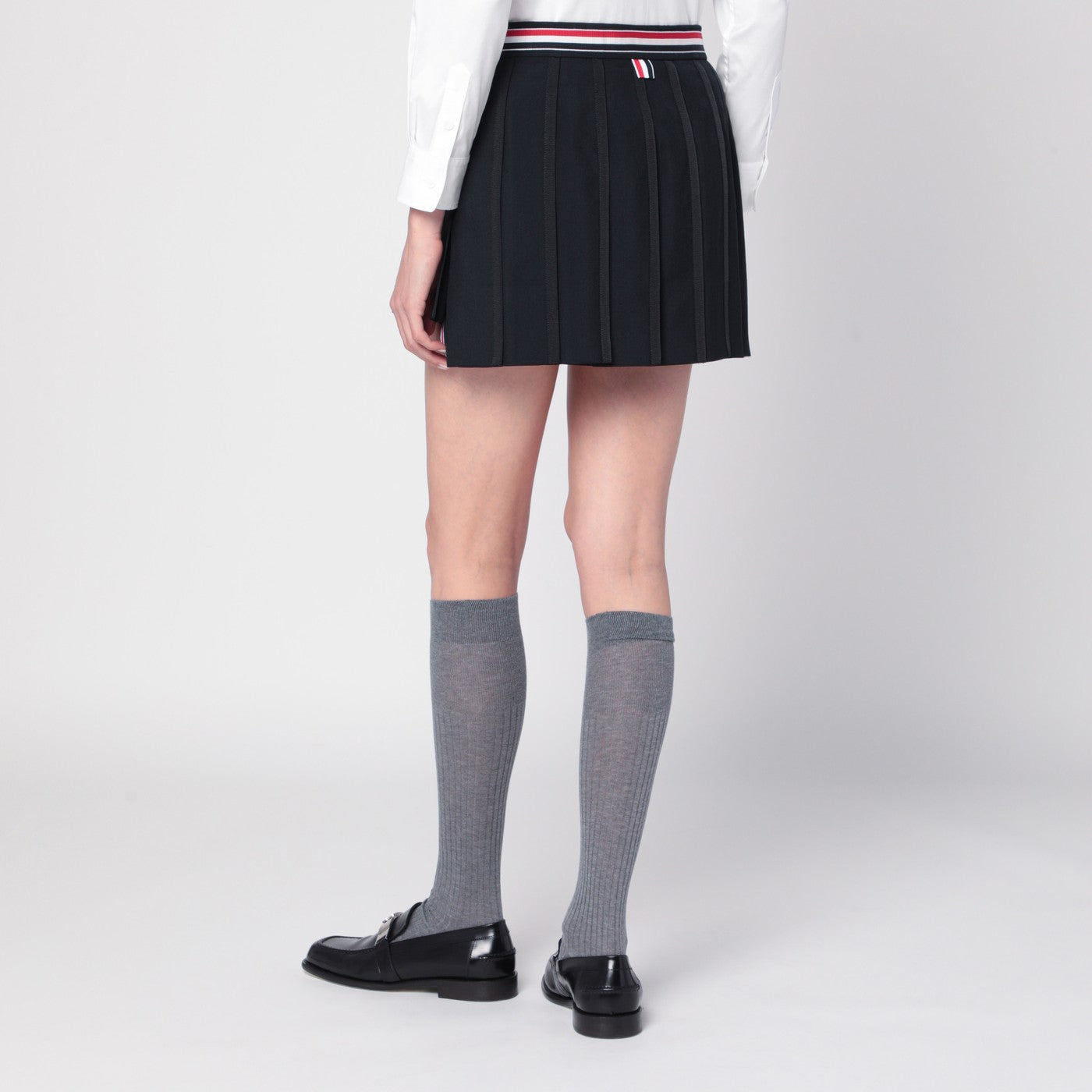 Black ruffled mini skirt in wool blend
