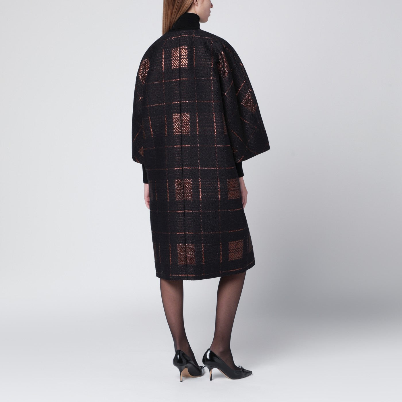 Black cocoon coat in jacquard lamé
