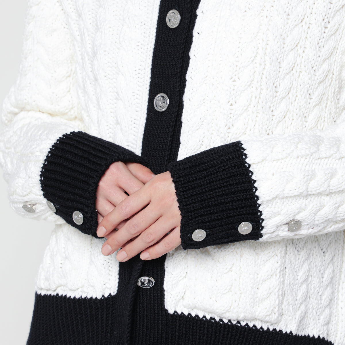 White cable-knit cardigan in wool