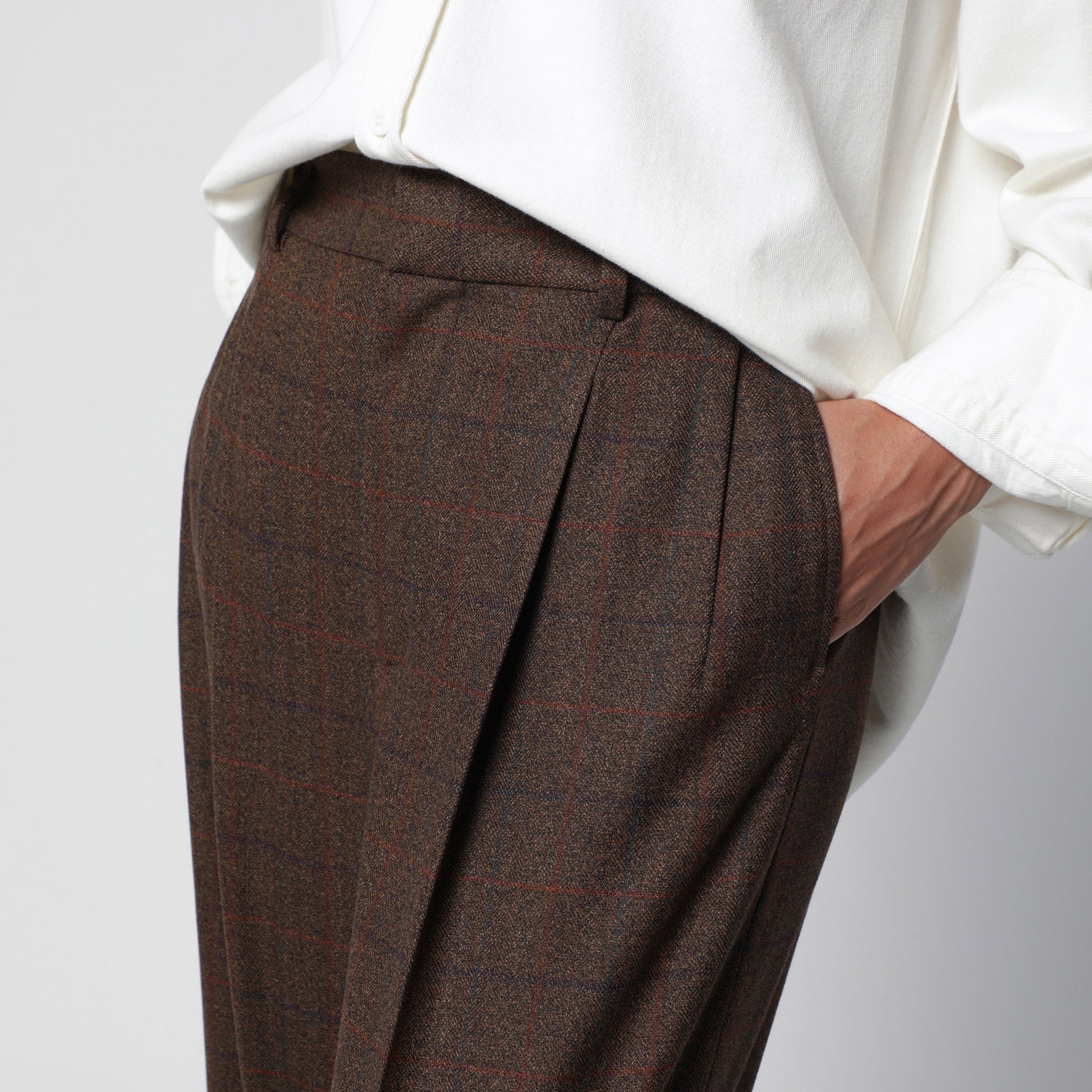 Pantaloni marroni con motivo check in lana e cashmere