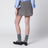 Grey suede mini skirt with large buckle belt