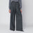 Wide dark grey striped trousers