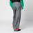 Pantaloni grigi/rossi in tessuto con finitura lucida