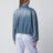 Giacca con zip blu in denim washed