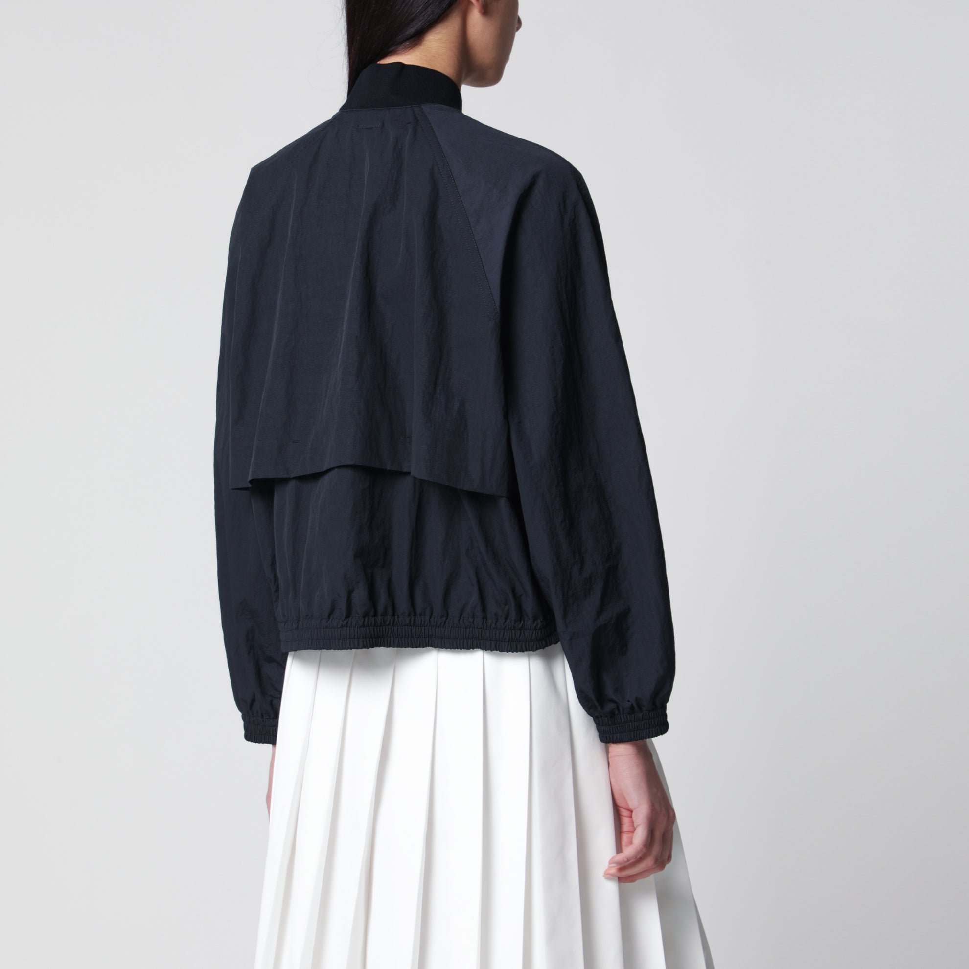 Blue zip-up nylon jacket