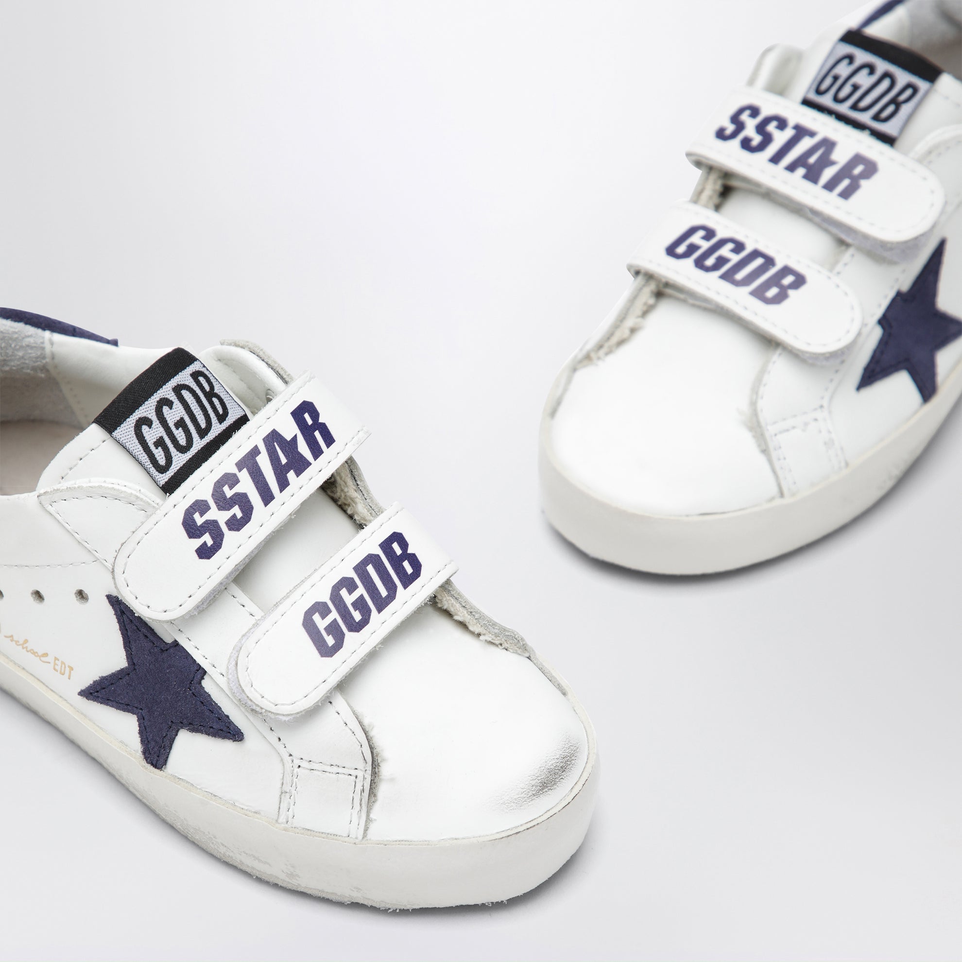 Sneakers Old School en cuir blanc/bleu