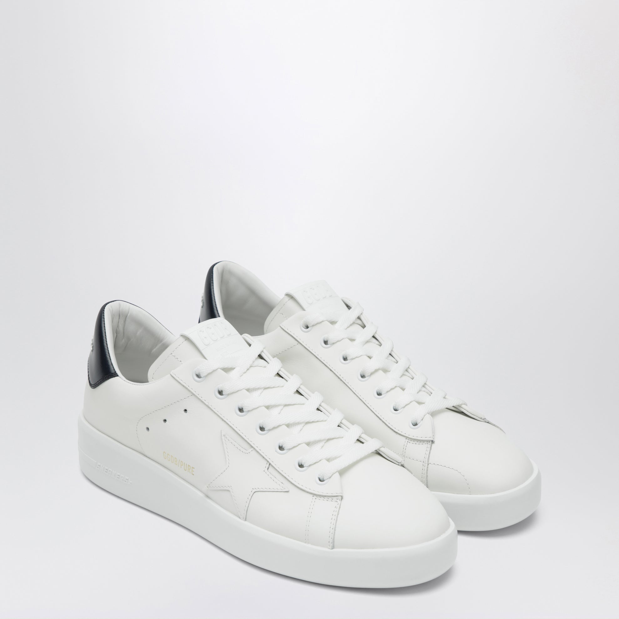 White/blue Purestar trainers