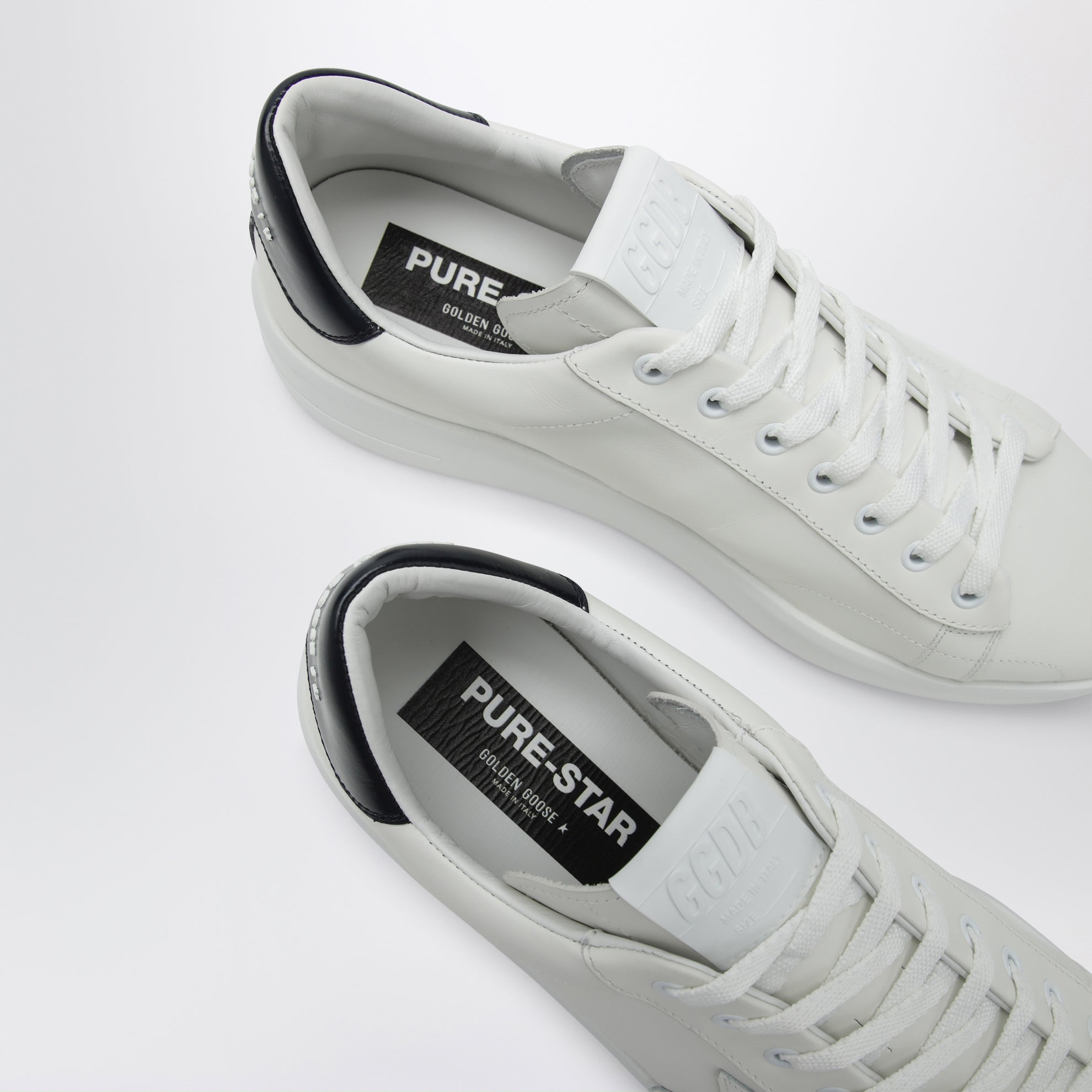 White/blue Purestar trainers