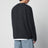 Grauer Pullover aus Boucléwolle