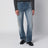 Jeans blu effetto slavato con placca logo