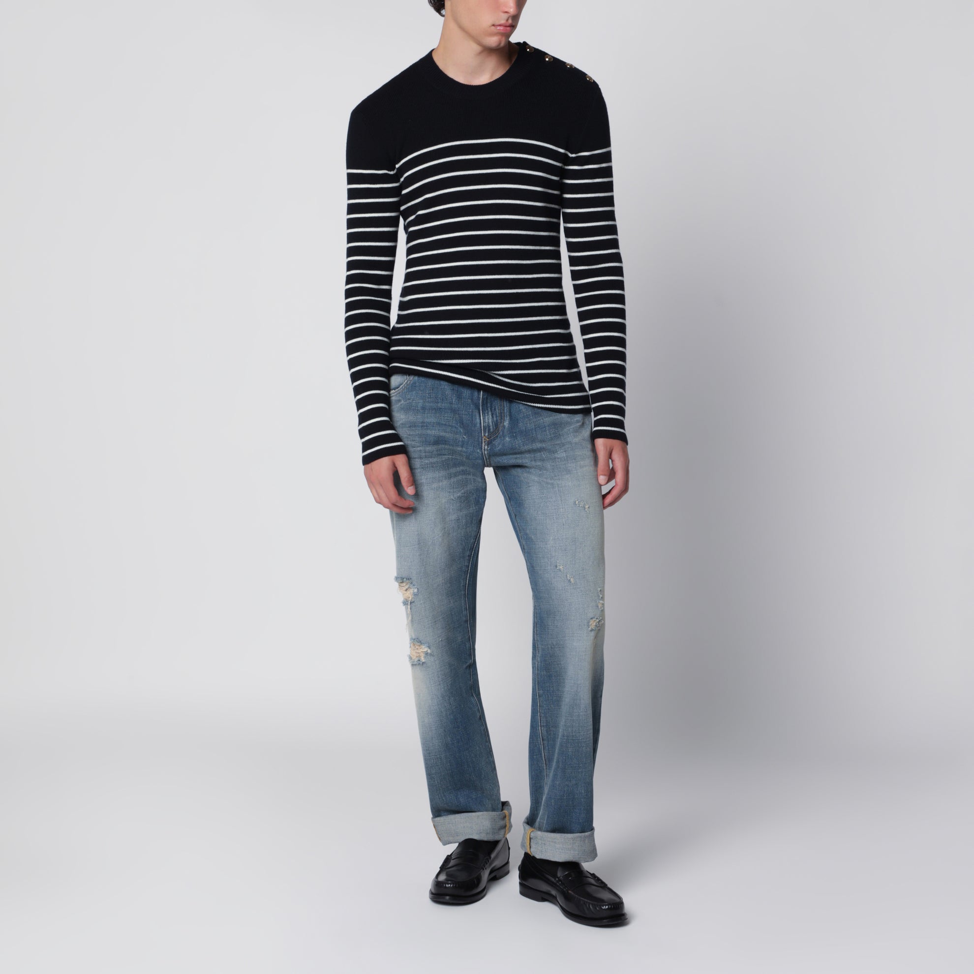 Jeans blu effetto slavato con placca logo