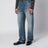 Jeans blu effetto slavato con placca logo