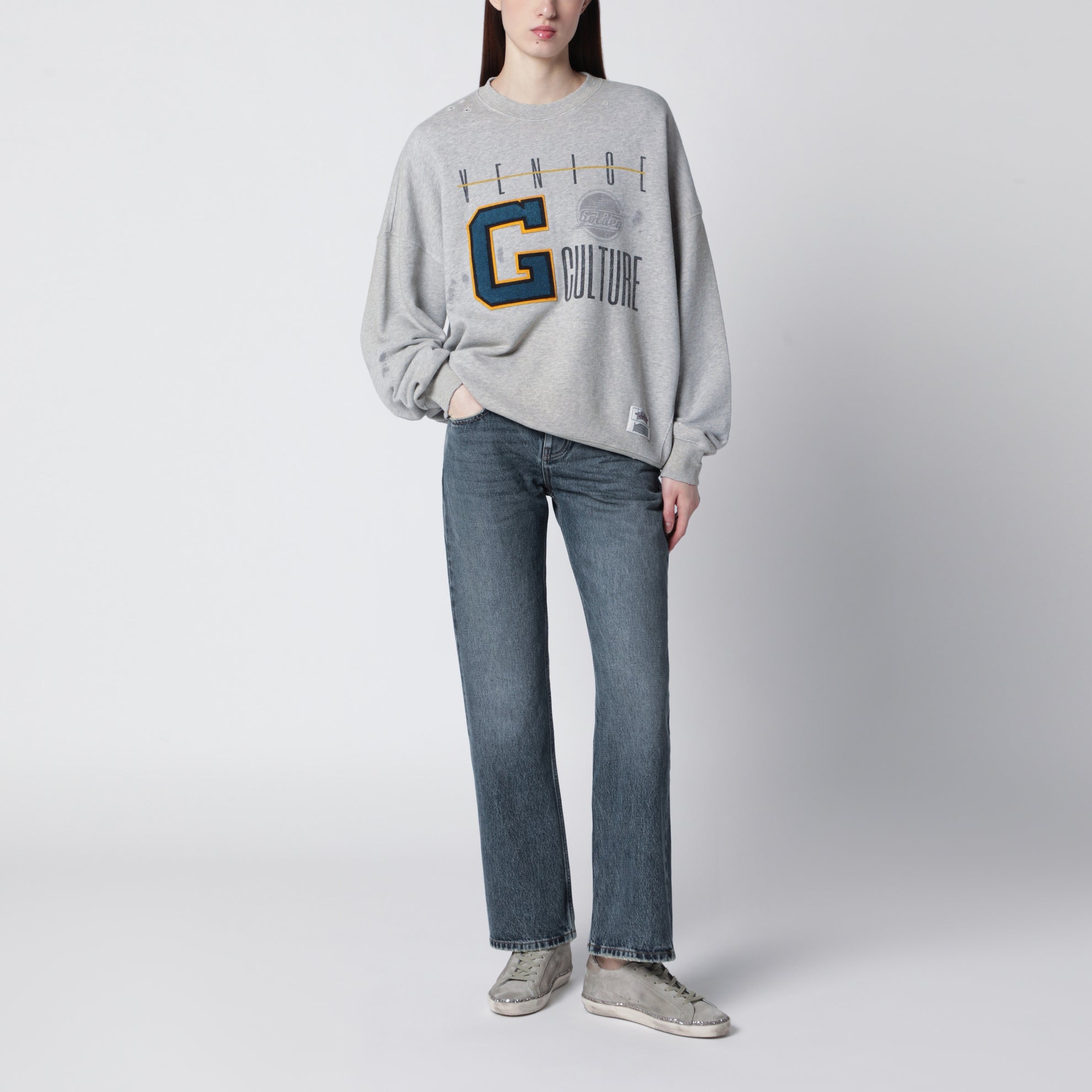 Grey sweatshirt with college logo graphic