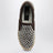 Slip-on marroni in suede con borchie