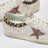Weiße und beige Super-Star-Sneaker mit Ponyfell-Details