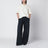 Black wide-leg cotton trousers
