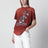 Rust-colored cotton T-shirt with floral print