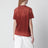 T-shirt in cotone color ruggine con stampa floreale