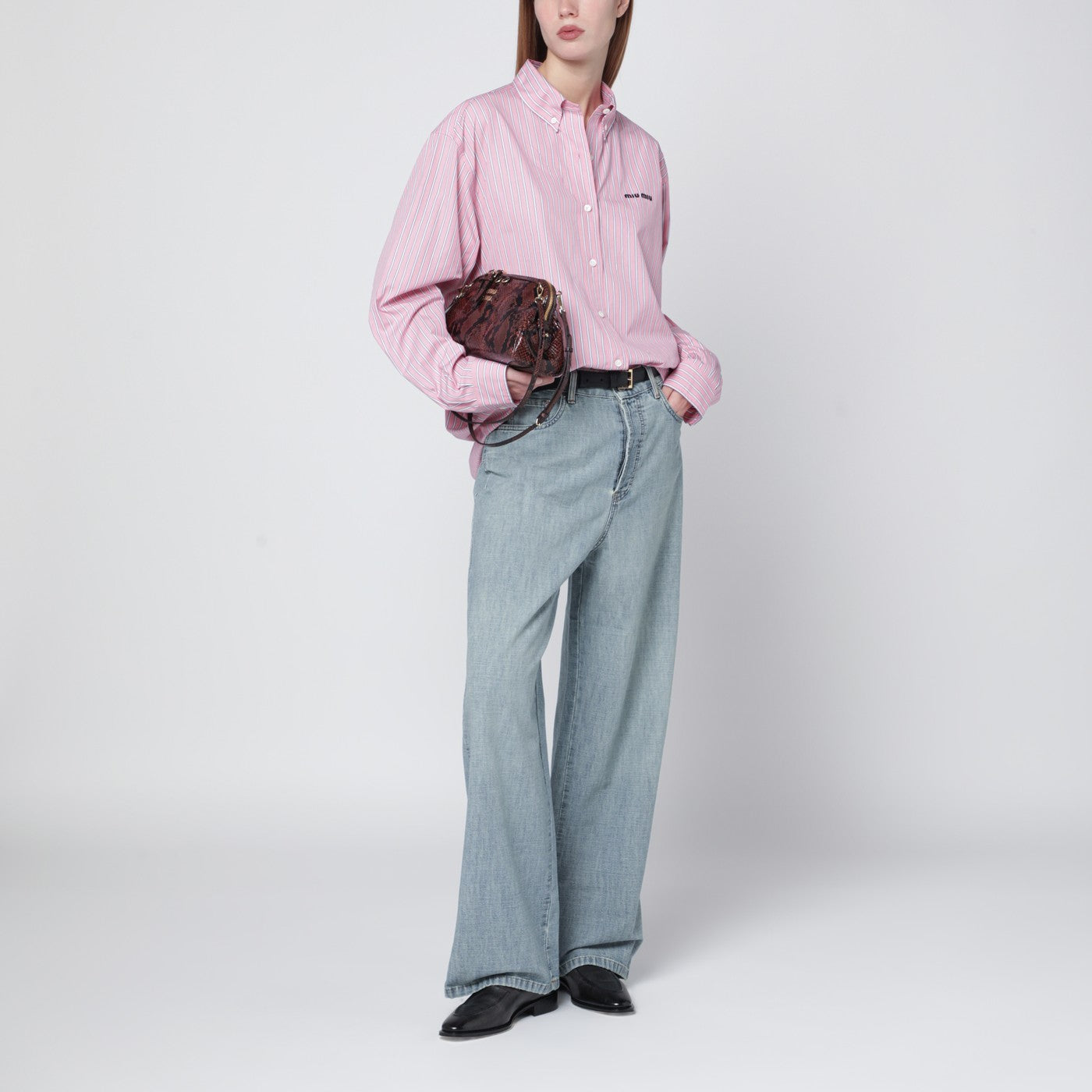 Light blue jeans with logo on the back
