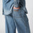 Pantaloni bleached in chambray di cotone azzurri