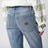 Light blue washed denim trousers