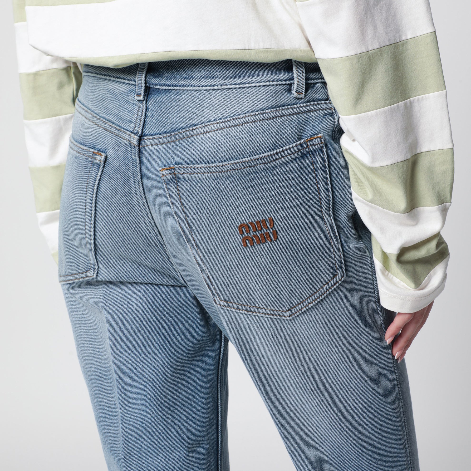 Light blue washed denim trousers