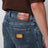 Jeans slim in denim blu effetto slavato