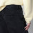 Anagram black wide-leg cotton jeans