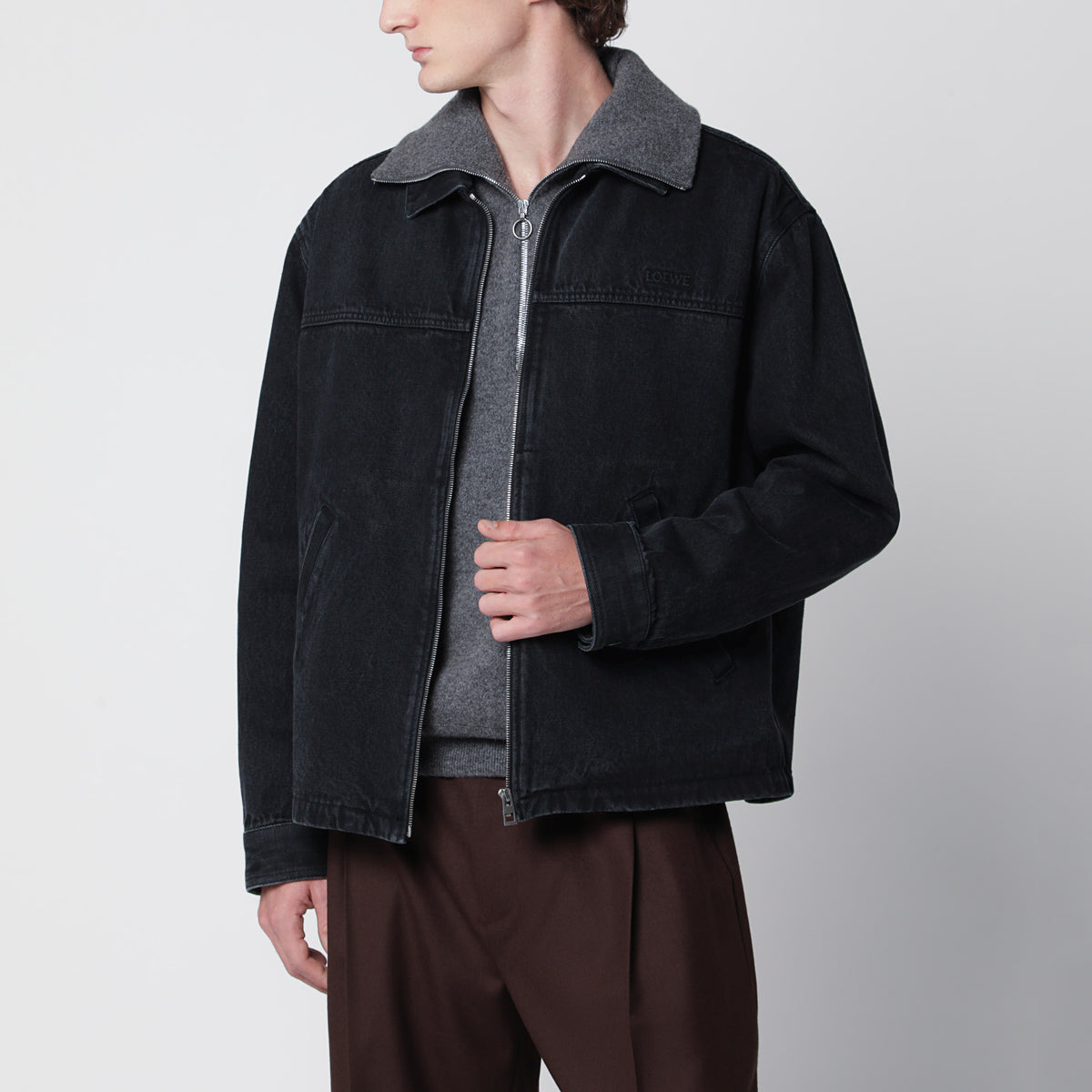 Black zip-up jacket in denim
