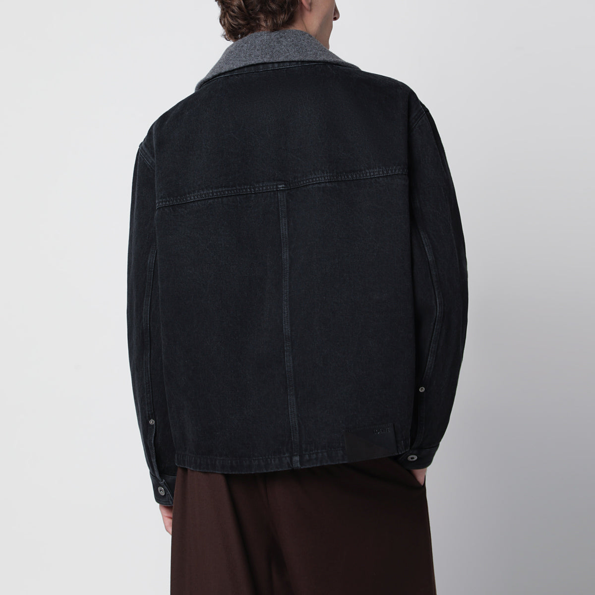 Black zip-up jacket in denim