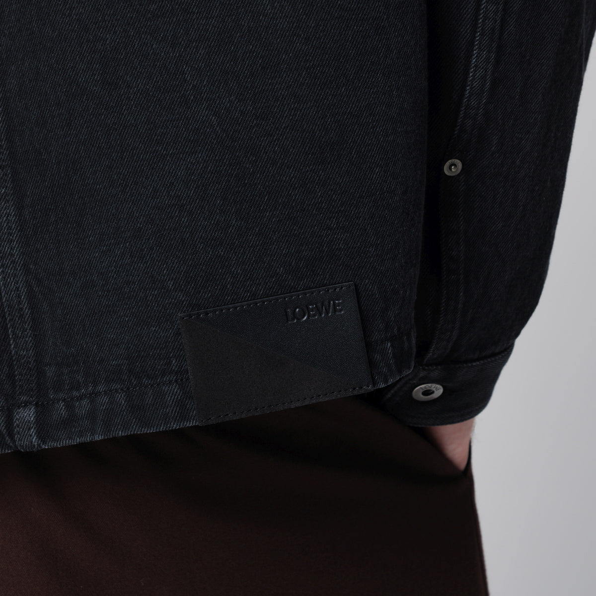 Black zip-up jacket in denim
