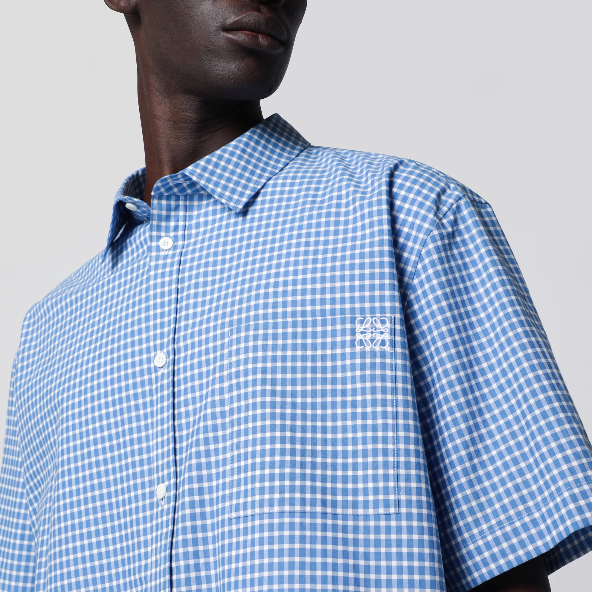 Camicia a maniche corte in cotone a quadri blu/bianca