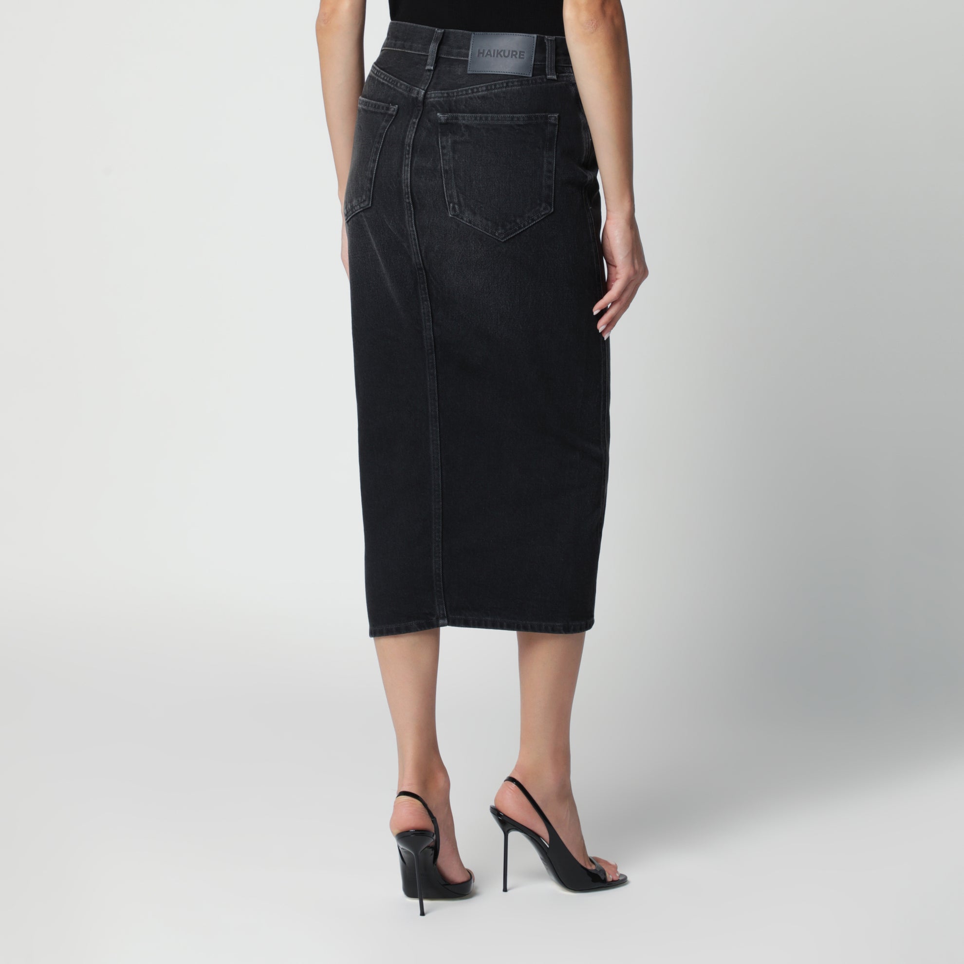 Washed black denim skirt with front zip