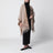 Poncho jacquard con frange in lana color sabbia