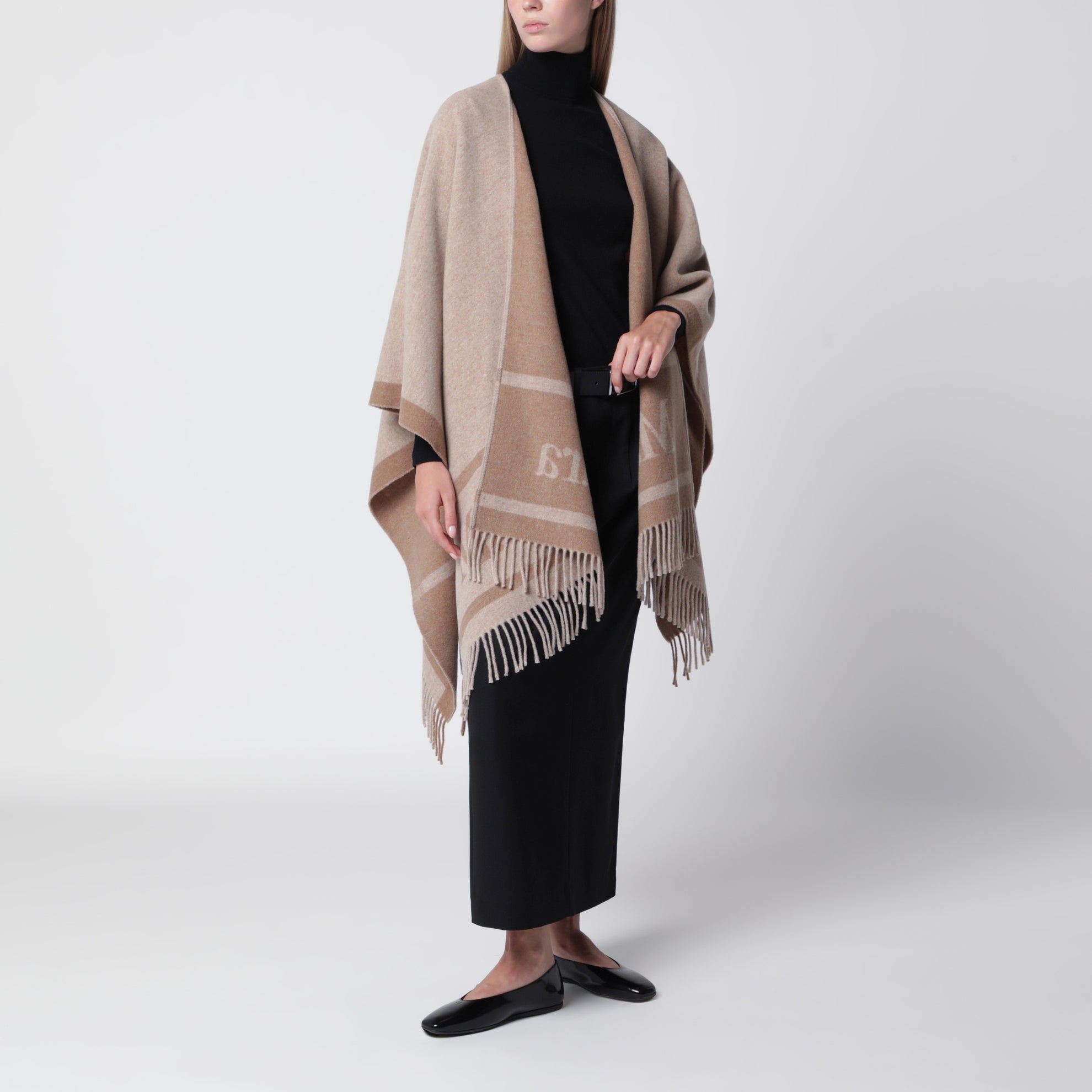 Jacquard poncho with fringes in sand-colored wool