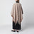 Jacquard poncho with fringes in sand-colored wool