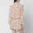 Beige blouse with floral print