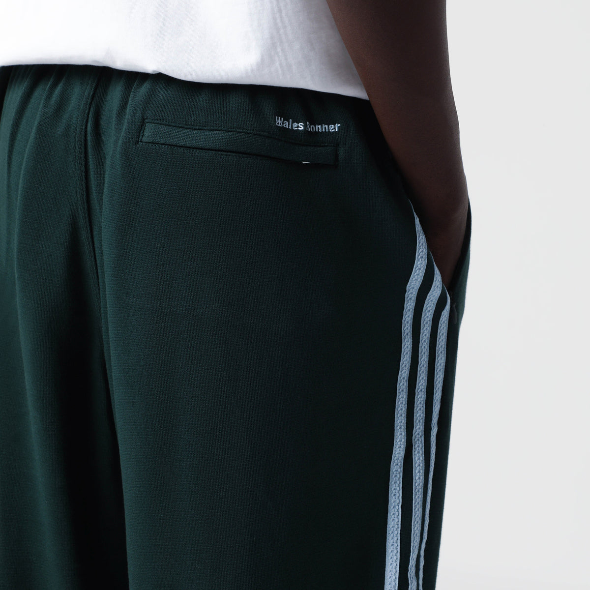 Dark green jogging trousers