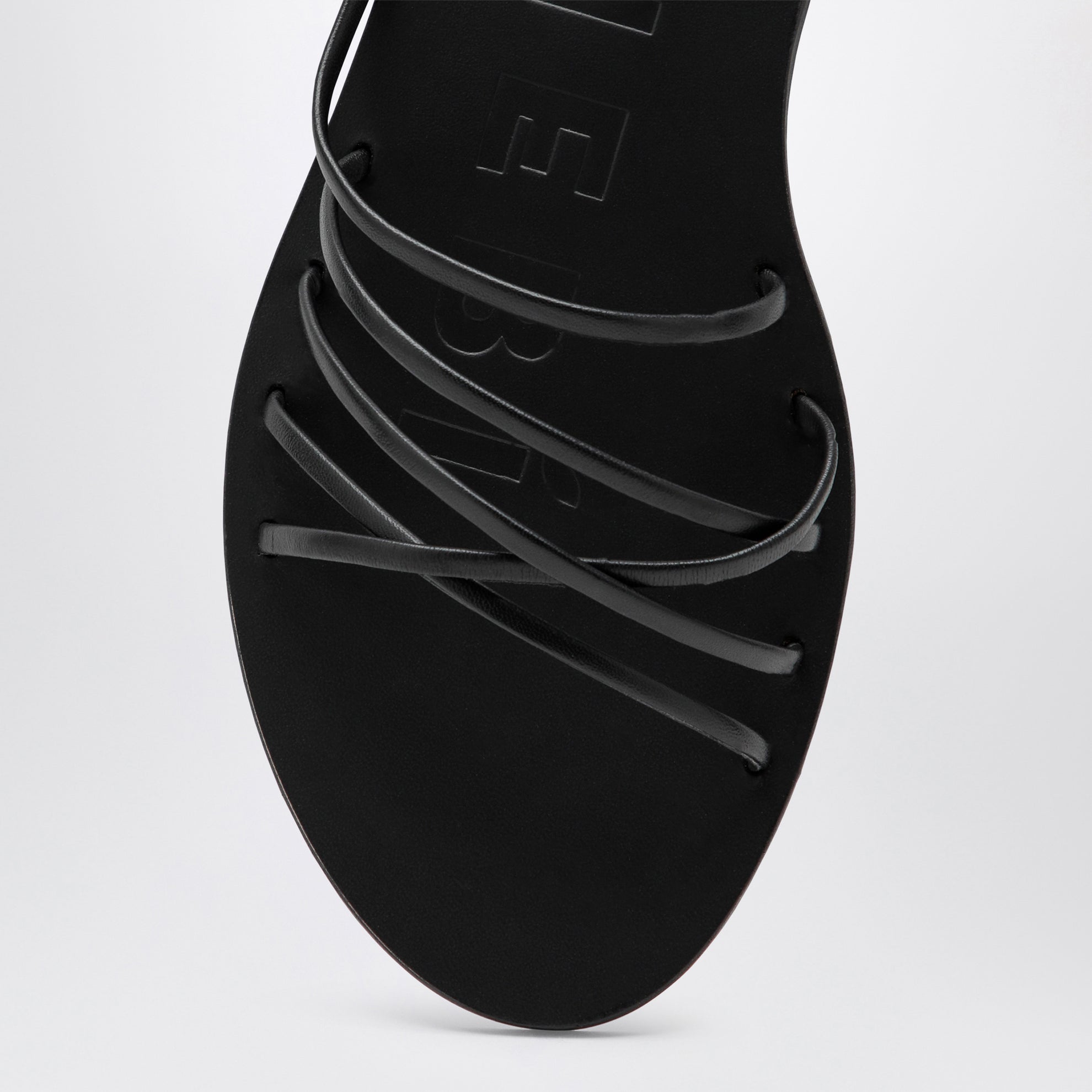 Black crossover leather sandals