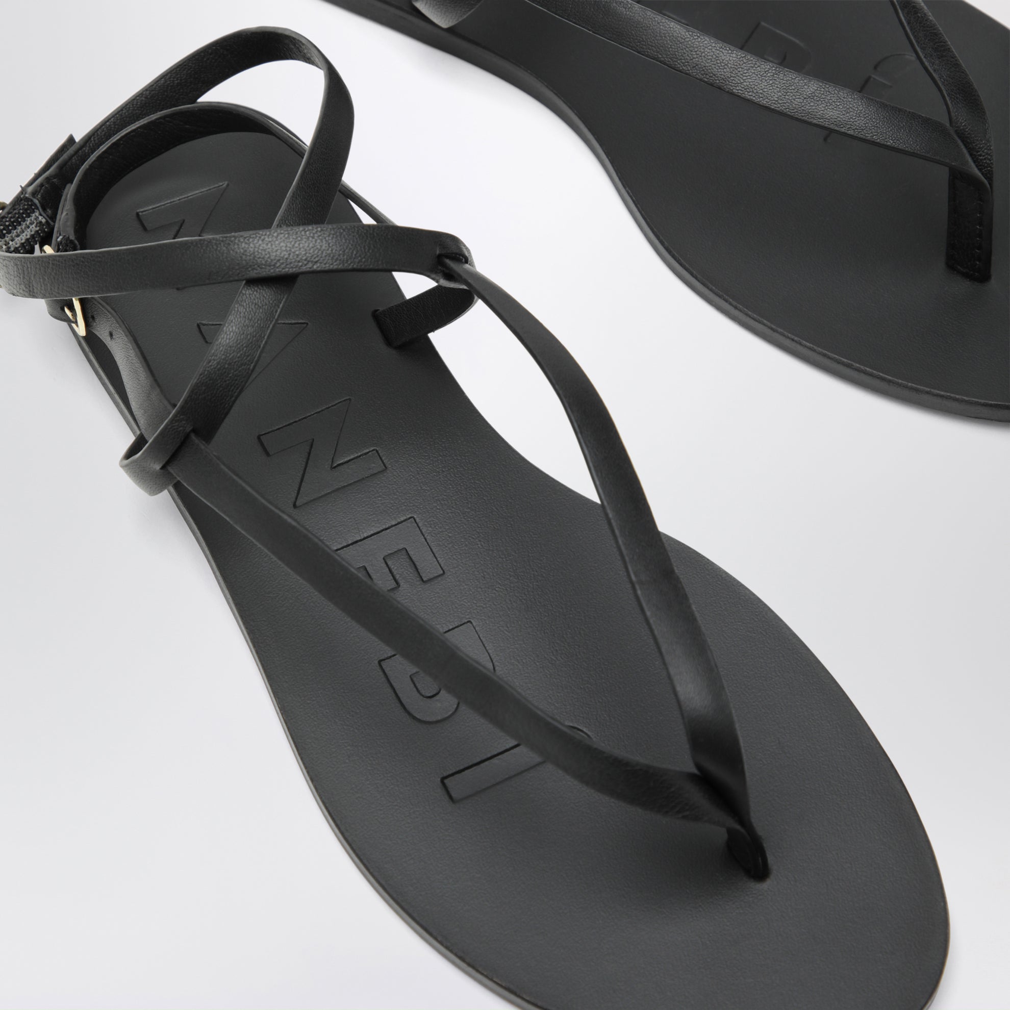 Black smooth leather crossover sandals
